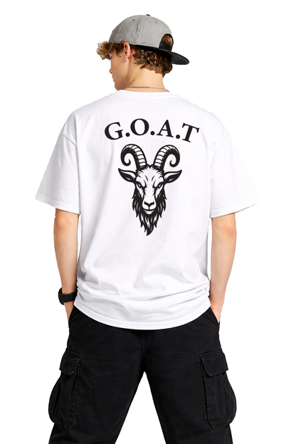 Person wearing a white t-shirt with 'G.O.A.T.' and a goat logo on the back, standing against a white background.
